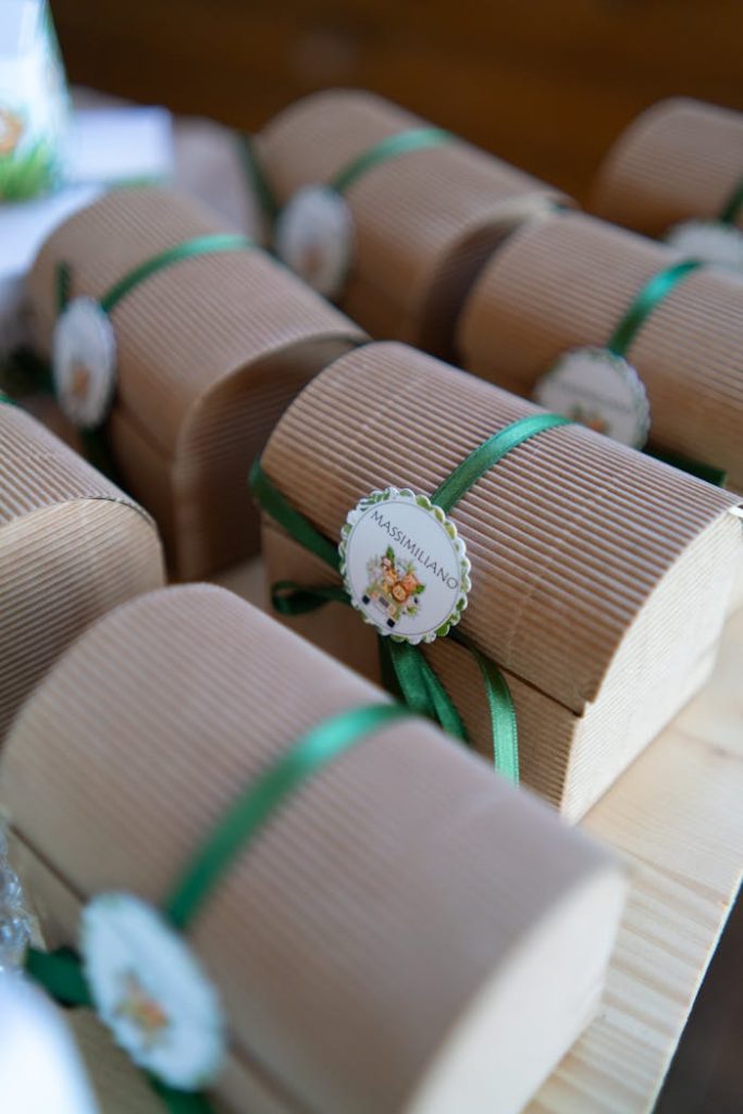 boxes-of-massimiliano-chocolates-tied-with-a-green-ribbon-19522978 Corrugated boxes tied with green ribbons, ideal for gifts and special occasions.